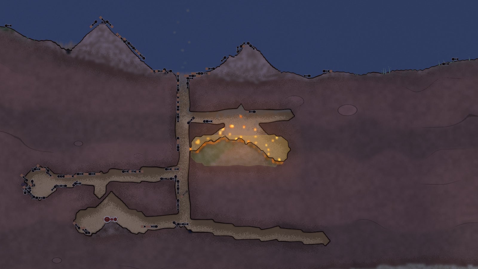 A nest at night with a fire burning in the seed store. Sparks rise into the gallery above and ants crowd the shaft and the far tunnels.